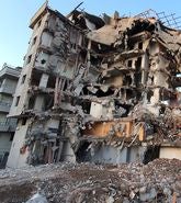 Building destroyed by magnitude 7.8 earthquake that struck the Turkish province of Kahramanmaras