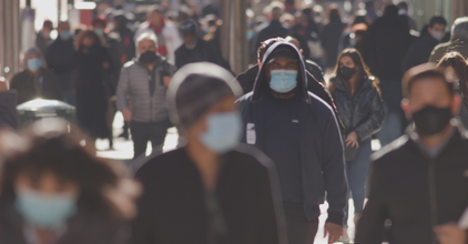 Pedestrians wearing masks