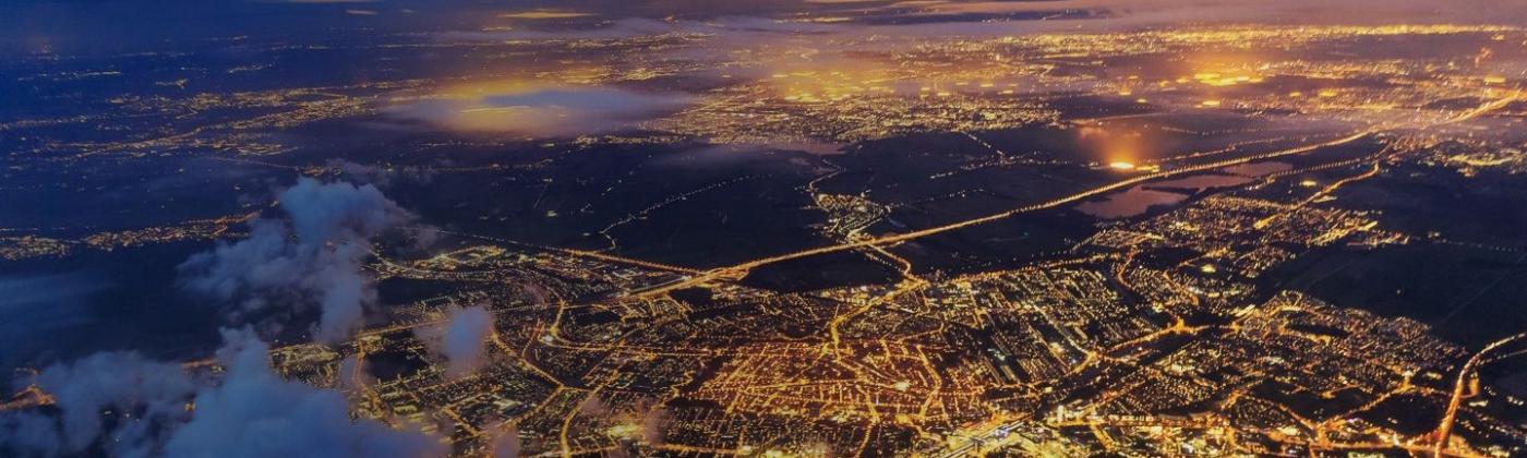 Aerial view of city landscape at night