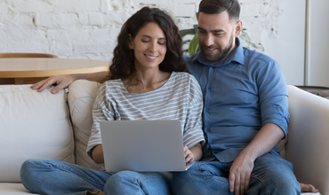 Couple buying insurance online